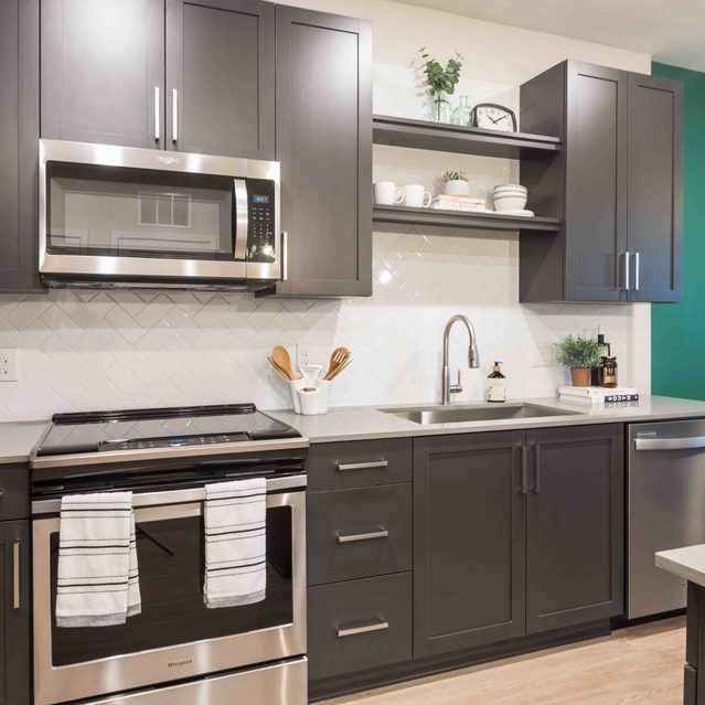 Live 8 West - Kitchen with black cabinets