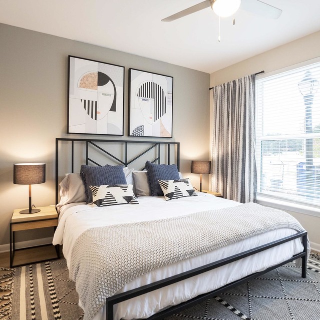 Live 8 West - Modern bedroom with ceiling fan